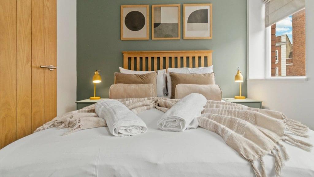 Stay in comfort and style in this wooden king double bed room in Worcester, designed with elegant furniture and perfect for a restful night's sleep
